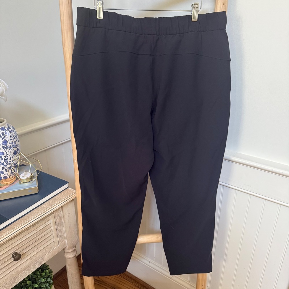 Lululemon On the Fly 7/8 Pant Black Luxtreme Jogger Women Size 12 LW5BPMS - Picture 2 of 7